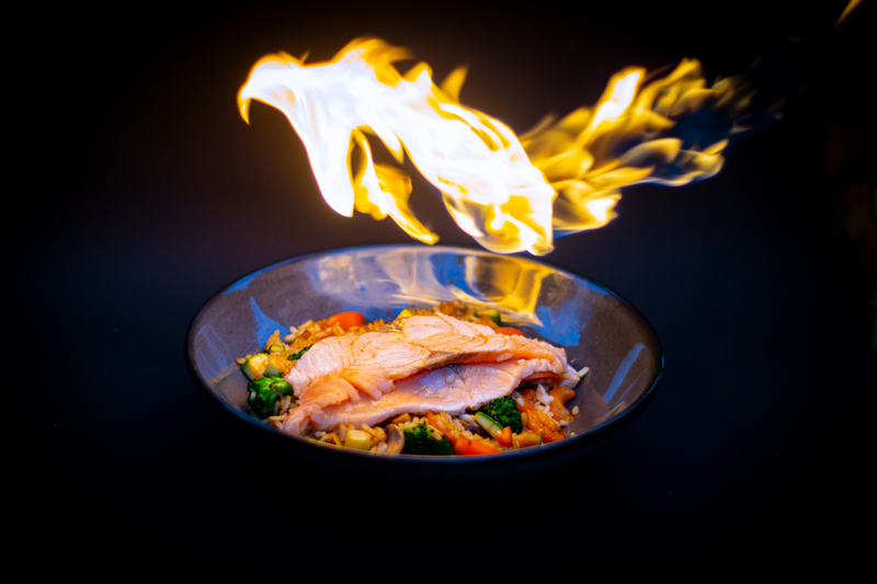 Quinoa protein bowl with grilled salmon and avocado